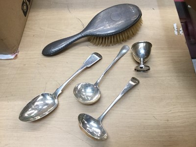 Lot 673 - Georgian silver fiddle pattern table spoon, silver Old English pattern ladle, another silver ladle, silver egg cup and silver backed brush (5)