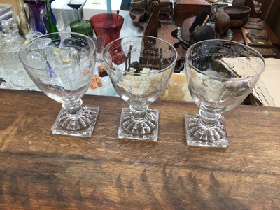 Lot 198 - Three 19th century glass rummers, with lemon squeezer bases, etched with a star and circle pattern