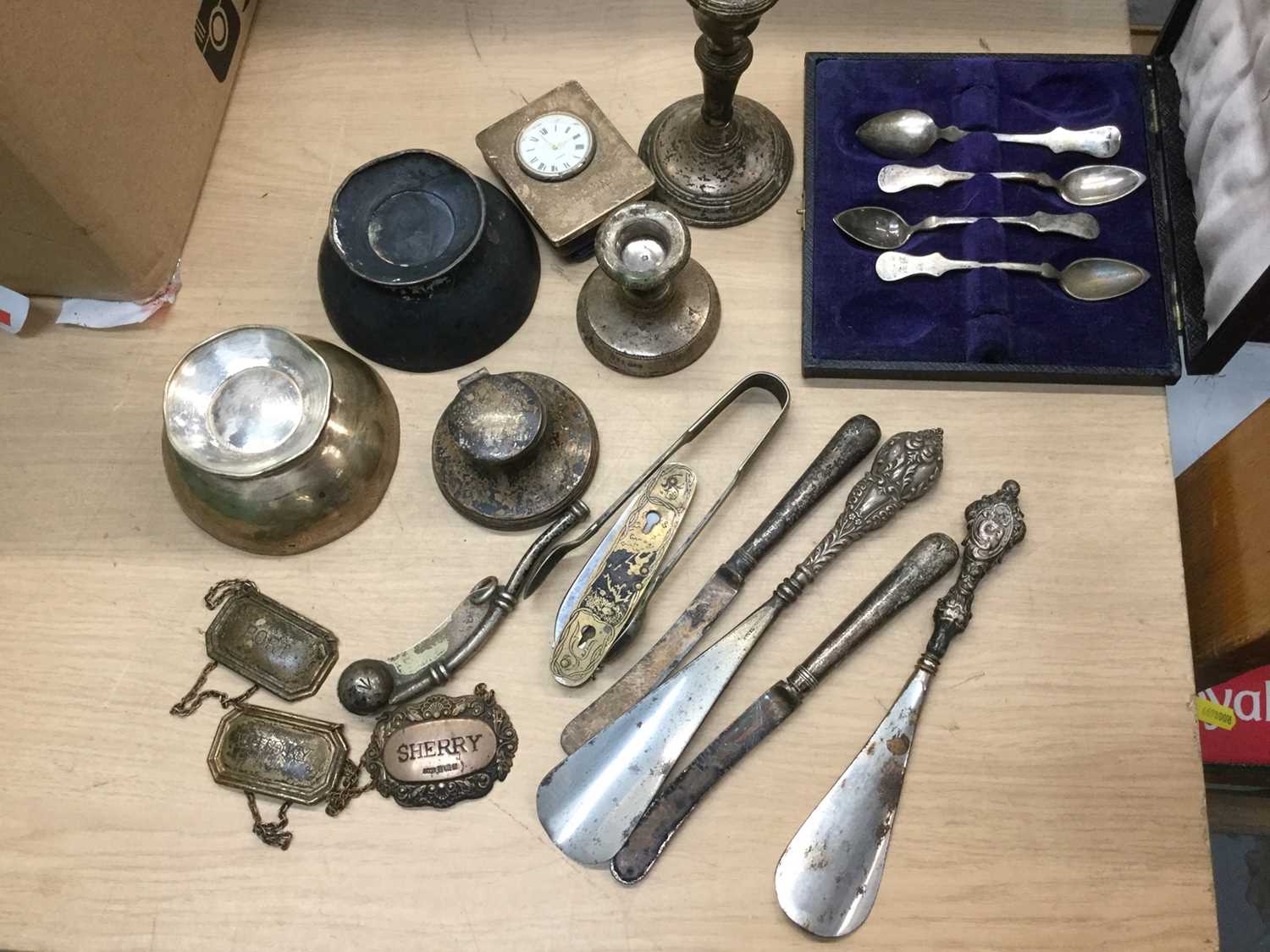 Lot 684 - Group of silver, white metal and sundry items to include Austrian silver teaspoons, candlesticks, inkwell and decanter labels