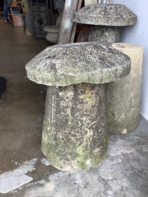 Lot 1057 - Concrete staddle stone, 60cm high, 49cm diameter, and one other staddle stone base, 54cm high (2)