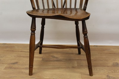 Lot 1171 - Mid 19th century elm and fruitwood stick back Windsor chair