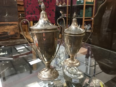 Lot 697 - Pair of silver two handled trophy cups and covers with engraved presentation inscriptions