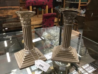 Lot 699 - Pair of Edwardian silver Corinthian column candlesticks (Sheffield 1903)