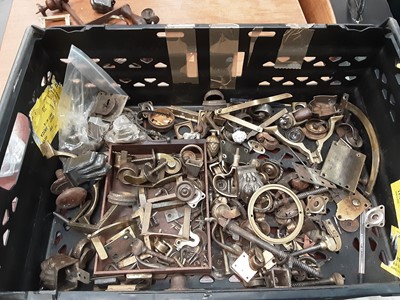 Lot 9 - Collection of furniture fittings including brass castors, table clips, winding handles, and some clock pendulums
