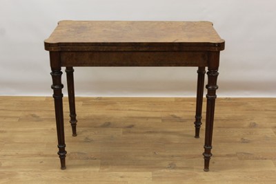 Lot 1419 - Rare Victorian burr walnut card table by Gillow & Co, rectangular fold over top with projecting angles, enclosing baize lined interior with dished corners, supported by pull out rear section, raise...