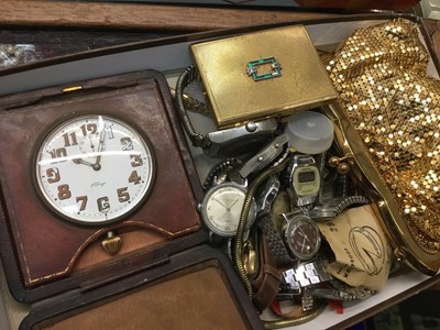 Lot 711 - 1920's eight day travelling clock in leather case, together with various wristwatches and other items