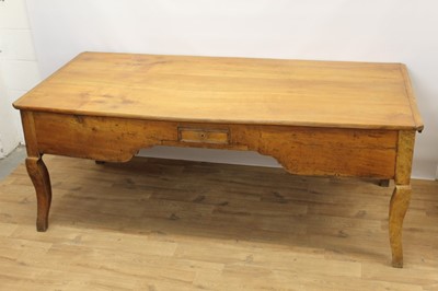 Lot 1449 - 19th century French fruitwood farmhouse table, canted rectangular plank top over end deep drawers and single central frieze drawer on square cabriole legs, 92cm deep x 209cm long  81cm high