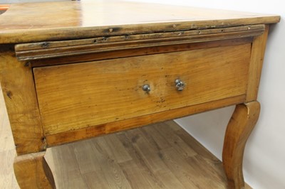 Lot 1439 - 19th century French fruitwood farmhouse table, canted rectangular plank top over end deep drawers and single central frieze drawer on square cabriole legs, 92cm deep x 209cm long  81cm high