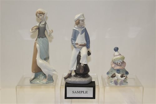 Lot 1023 - Eight Lladro porcelain figures and animals...