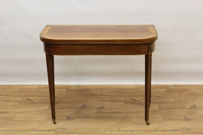 Lot 1476 - George III mahogany satinwood and tulipwood crossbanded D-shaped card table