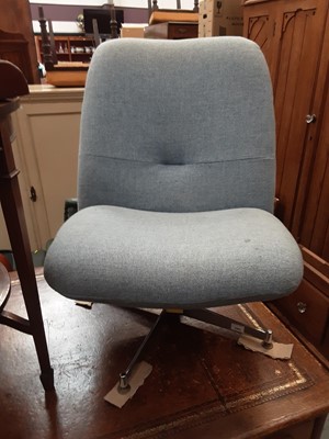 Lot 1083 - Stylish blue upholstered swivel chair on chrome plated base
