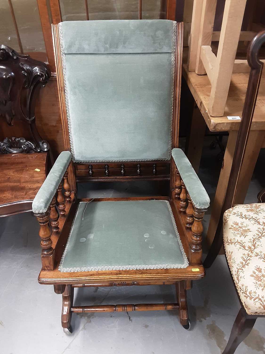 Lot 935 - Late Victorian rocking chair with green upholstery