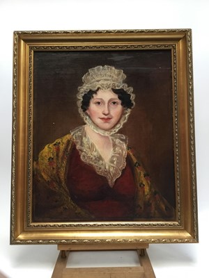 Lot 65 - Victorian School, oil on canvas laid down onto board,, half length portrait of a lady in lace bonnet