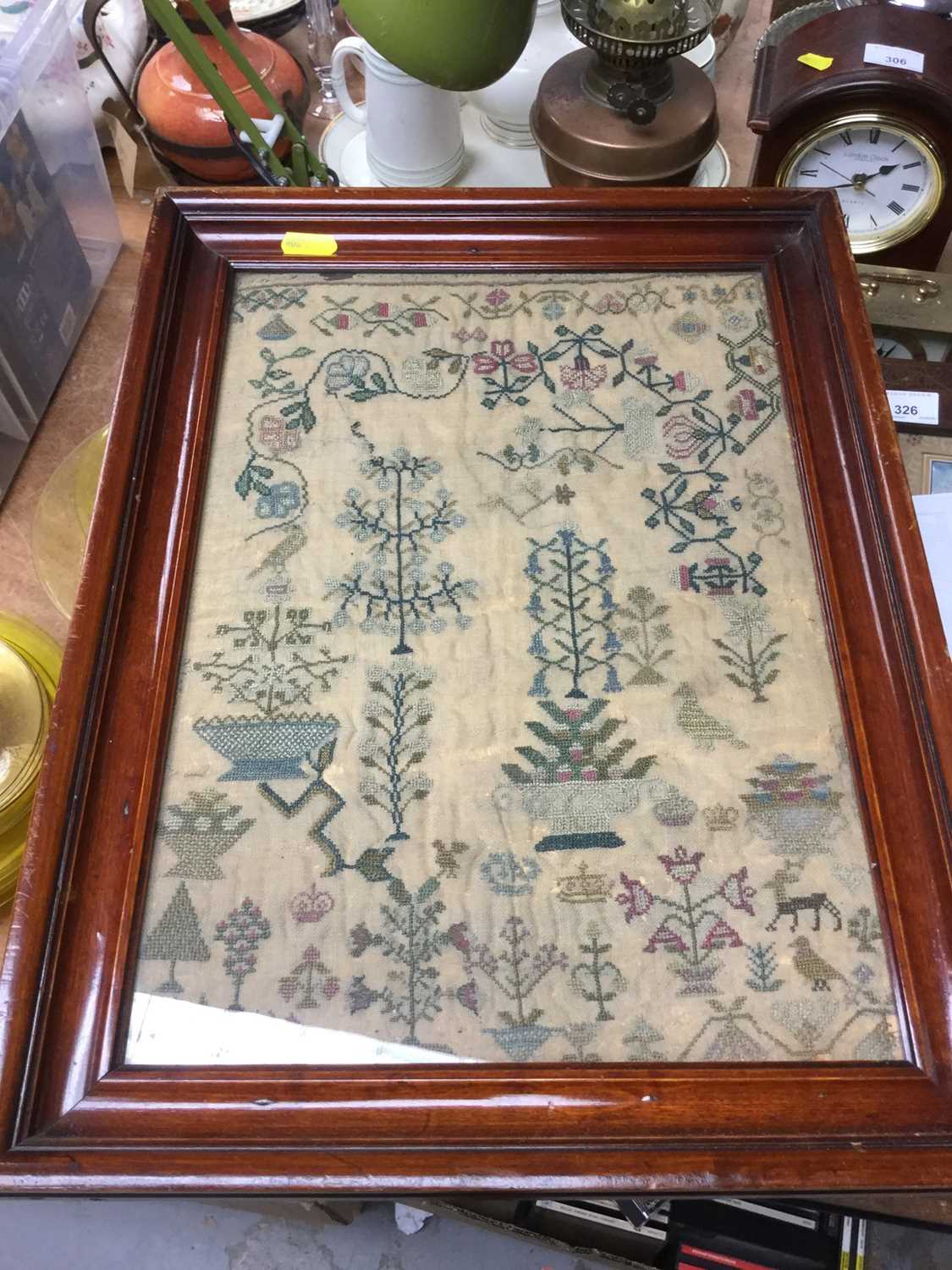 Lot 348 - 19th century needlework sampler in glazed