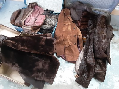 Lot 467 - Collection of vintage clothing including fur and faux fur jackets in three old suitcases