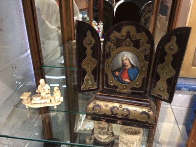 Lot 250 - Japanese ivory okimono, together with a French reliquary with porcelain painting of a Saint and a wooden mantel clock (3)