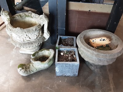 Lot 1108 - Two concrete garden pots plus three others