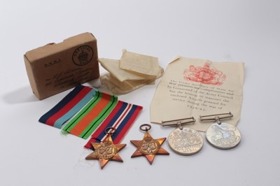 Lot 709 - Second World War medal group comprising 1939 - 1945 Star, France and Germany Star, Defence and War medals together with box of issue named to Mr Brawn, Chadwell Heath, Romford.