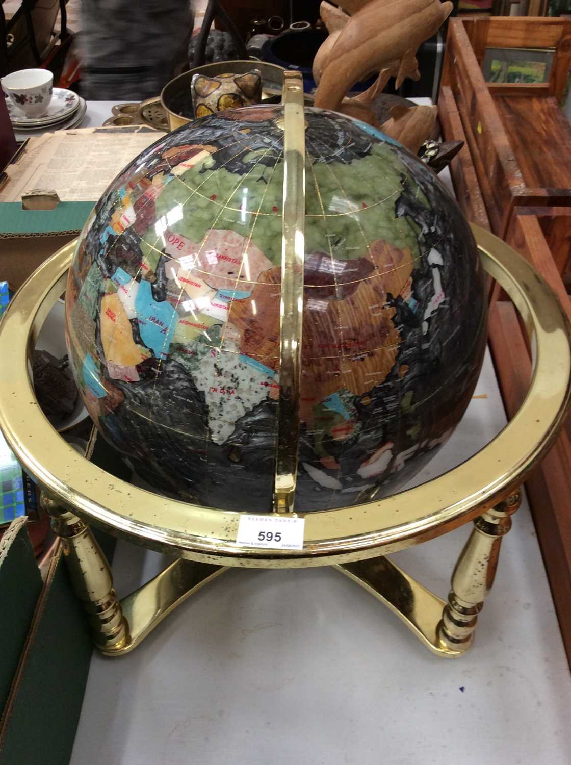 Lot 595 - Specimen world globe in gilt metal stand