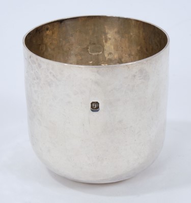 Lot 298 - Contemporary Scottish silver tumbler cup with spot hammered finish (Edinburgh 2008).