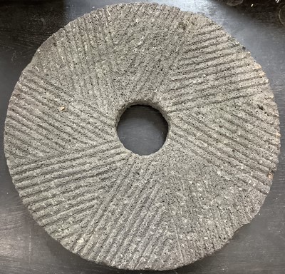 Lot 1547 - Olive grinding wheel