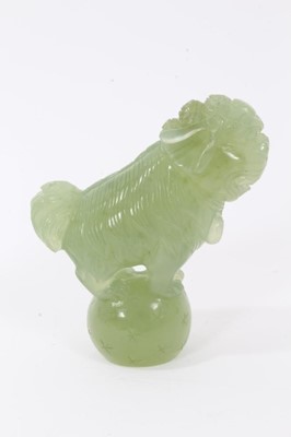 Lot 836 - Chinese carved green jade dog of foo