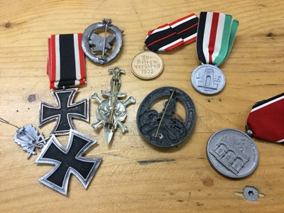 Lot 722 - Collection of replica Second World War Nazi badges and decorations to include Iron Cross (second class) and Anti Partisan War badge