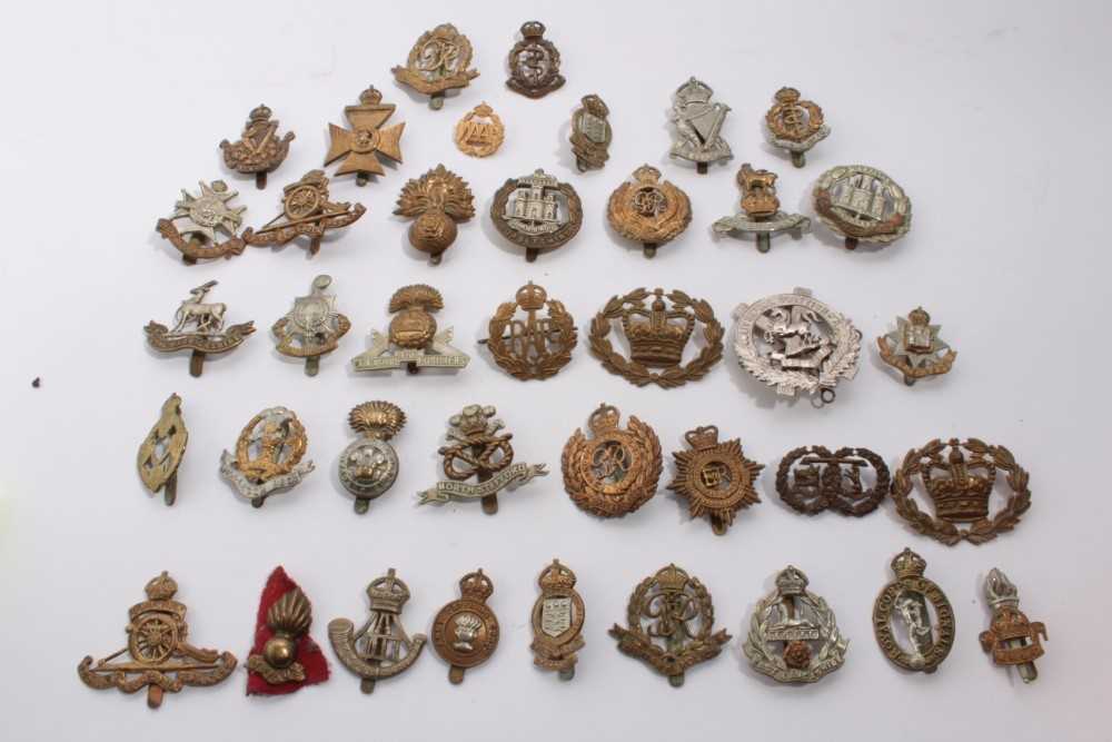 Lot 730 - Collection of approximately 38 British Military cap badges to include Royal Engineers, Royal Artillery and RAF