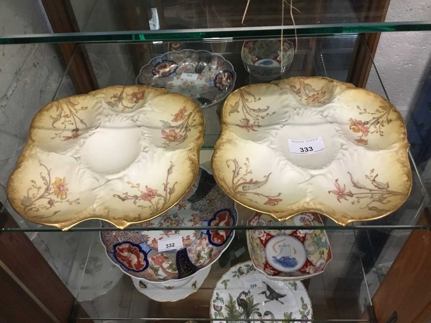 Lot 365 - Pair of Limoges porcelain oyster plates