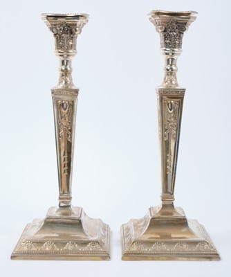 Lot 324 - Pair late 1920s silver candles sticks in the Georgian style, with tapering columns