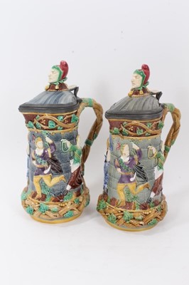 Lot 308 - A matched pair of Minton Majolica 'Tower' jugs, 1881 and 1883, 33cm height