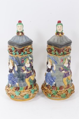 Lot 40 - A matched pair of Minton Majolica 'Tower' jugs, 1881 and 1883, 33cm height