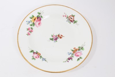 Lot 225 - Nantgarw plate, circa 1817-20, polychrome painted with flowers with gilt rim, impressed mark to base, 21cm diameter