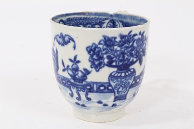 Lot 21 - Worcester coffee cup, circa 1780, printed in blue with the Bat pattern, 5.75cm high