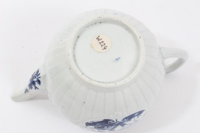 Lot 22 - Rare Worcester small strap-fluted teapot and cover, circa 1755, painted in blue with the Fisherman and Willow Pavilion pattern, workman's mark to base, 11cm high
