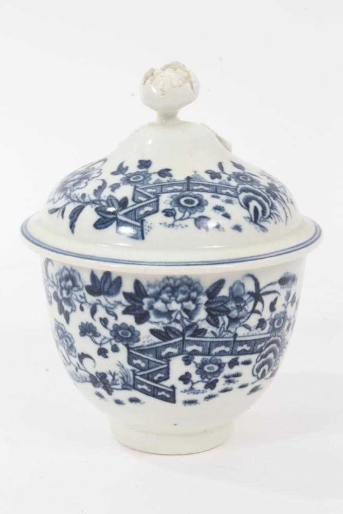 Lot 26 - Caughley sucrier and domed cover with flower finial, circa 1785, printed in blue with the Fence pattern, 12.5cm high
