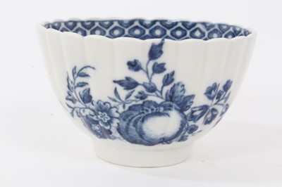 Lot 27 - Caughley tea bowl and saucer, circa 1780, of fluted form, printed in blue with the 'Apple' pattern, the saucer measuring 12.75cm diameter