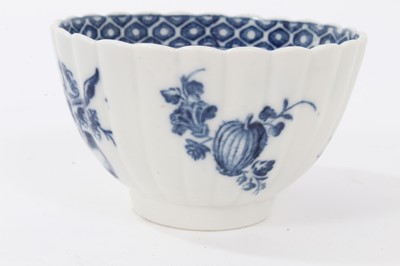 Lot 27 - Caughley tea bowl and saucer, circa 1780, of fluted form, printed in blue with the 'Apple' pattern, the saucer measuring 12.75cm diameter