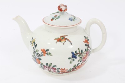 Lot 228 - An early Worcester teapot, circa 1754-55, polychrome painted in the Chinese style, with non-matching cover, 12cm high