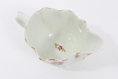 Lot 49 - Lowestoft ewer, circa 1790, of Low Chelsea form, polychrome painted with floral sprays, 5.75cm high