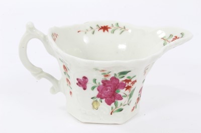 Lot 50 - Worcester cream boat, circa 1760, with hexagonal base, polychrome painted with flowers in the famille rose style, 5.75cm high