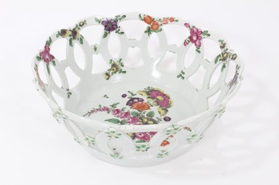 Lot 253 - Worcester pierced round basket, circa 1770, polychrome painted with flowers, 19.75cm diameter