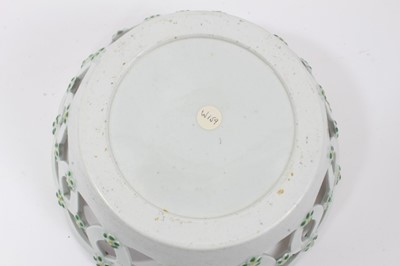 Lot 52 - Worcester pierced round basket, circa 1770, polychrome painted with flowers, 19.75cm diameter