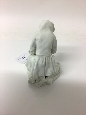 Lot 73 - Bow blanc de chine figure, circa 1755, in the form of a seated elderly man warming his hands on a brazier, emblematic of Winter, 12.5cm high