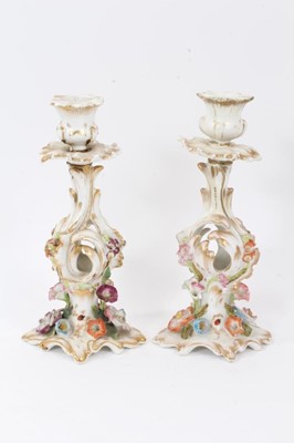 Lot 75 - Pair of Paris flower-encrusted candlesticks, circa 1860, with gilt scrollwork stems, 25cm tall