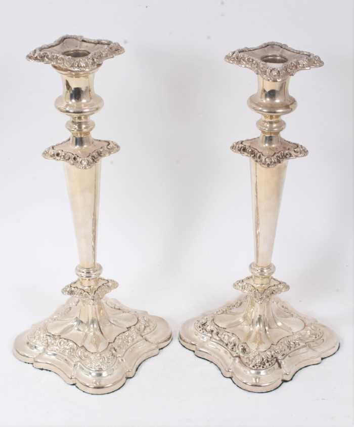 Lot 325 - Pair silver plated candlesticks, with tapering conical stems