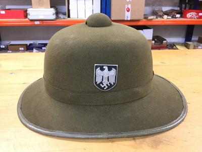 Lot 735 - Group of 5 replica Nazi Officers caps, side caps and helmets to include a replica Afrika Korps helmet (5)