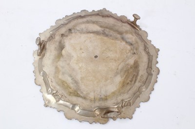 Lot 330 - George III silver salver of hexagonal form, with piecrust and scroll border, on three scroll feet