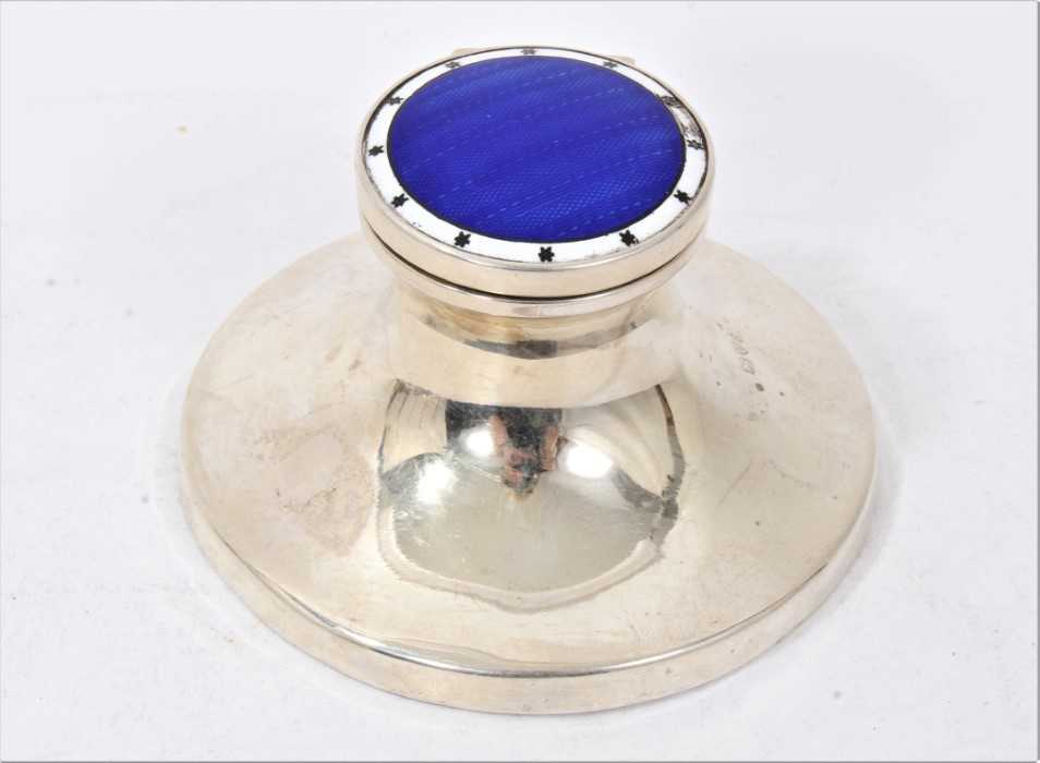 Lot 334 - Early George V silver inkwell of capstan form, with hinged blue and white enamelled cover