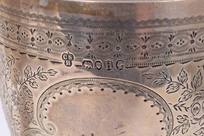 Lot 338 - Three silver trophy cups of conventional form, with engraved floral decoration and inscriptions